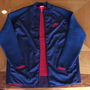 Nike Dynamic Reveal varsity jacket.